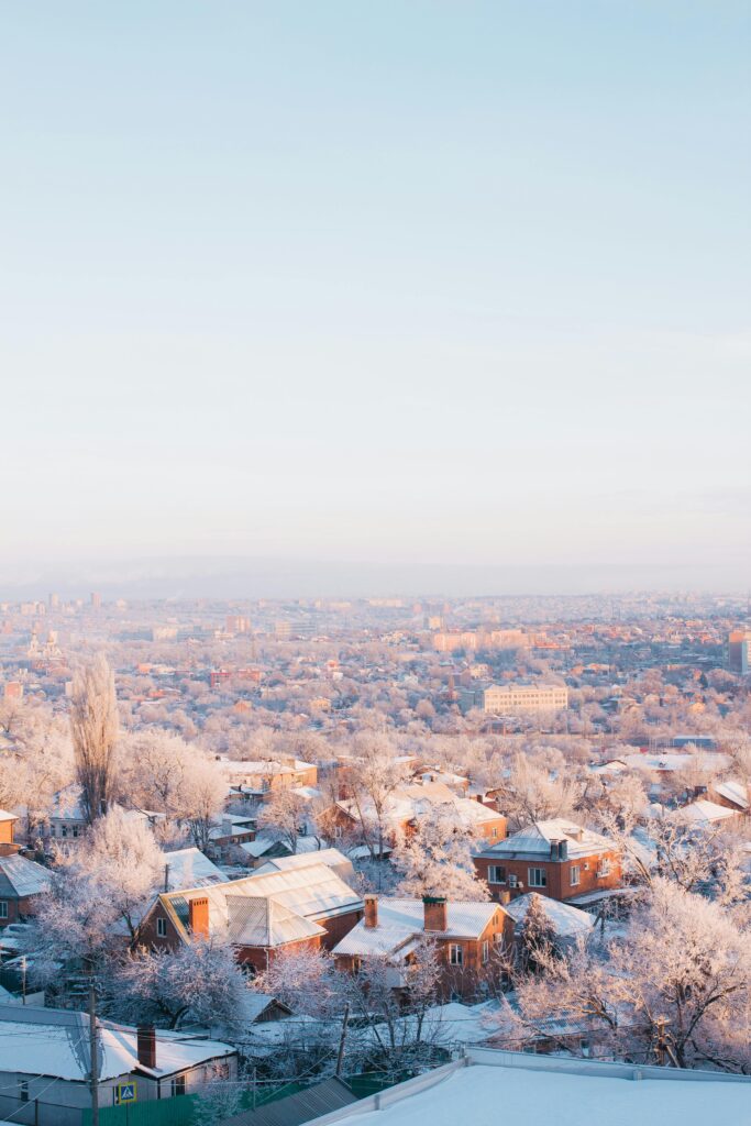 multiple snow covered houses